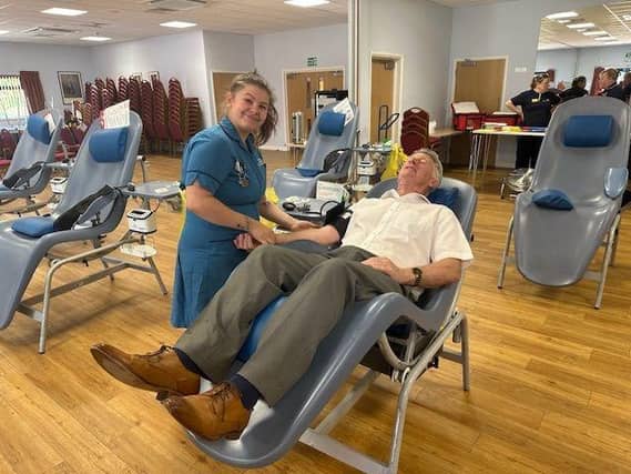 Deputy PGM Tim Almond giving blood