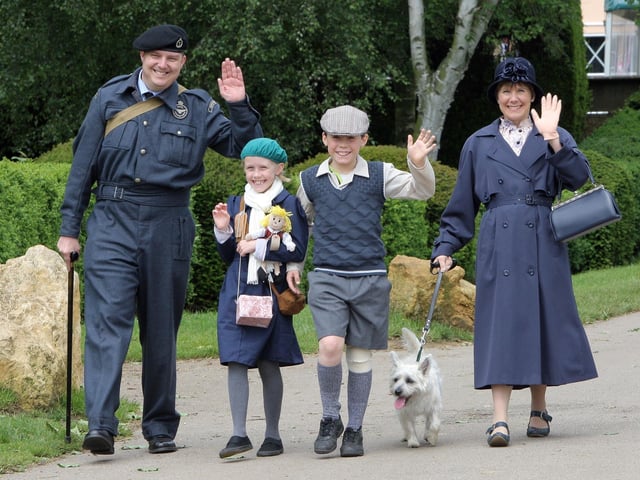 Wicksteed at War 1940's family Justyn Keeble, with his partner Sharon Stickland, and her children Emily, nine and Thomas, 12 with their dog Amos 2012