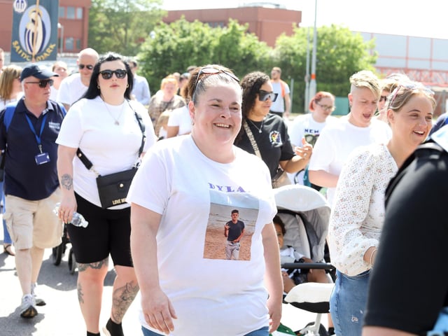 People wore t-shirts with pictures of loved ones lost to knife crime