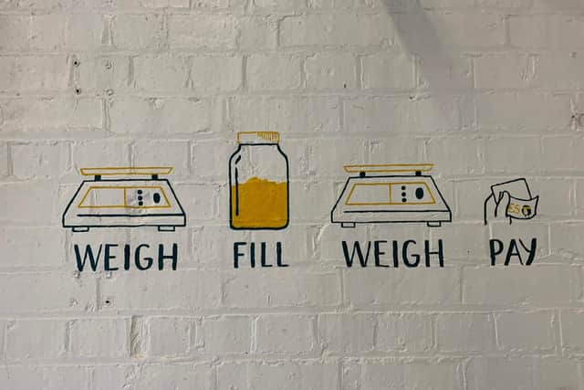 Customers are encouraged to weigh, fill, weigh and pay at Food For Thought