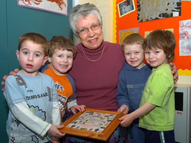Wellingborough: Croyland nursery school retirement - teacher Janet Southcott pictured with 4 of her pupils Ben Davies, Ethan Cox, Kieran Roberts and Lewis McLean. 2006