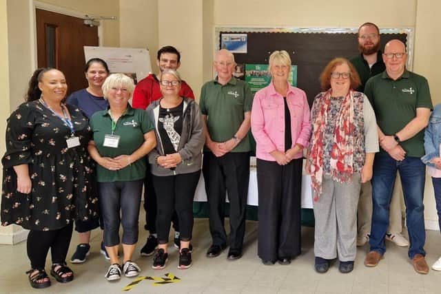 Corby Foodbank’s volunteers came together to meet its current chairperson Sue Kennedy (centre)