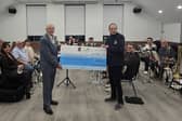 The cheque being presented to Raunds Temperance Band