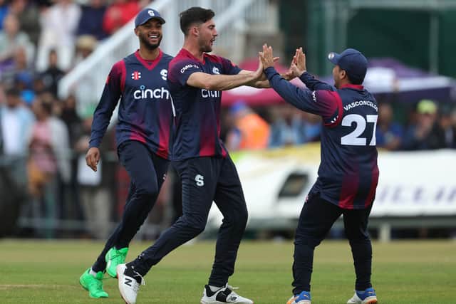 Brandon Glover celebrates after taking the wicket of Suryakumar Yadav during the T20 Tour match