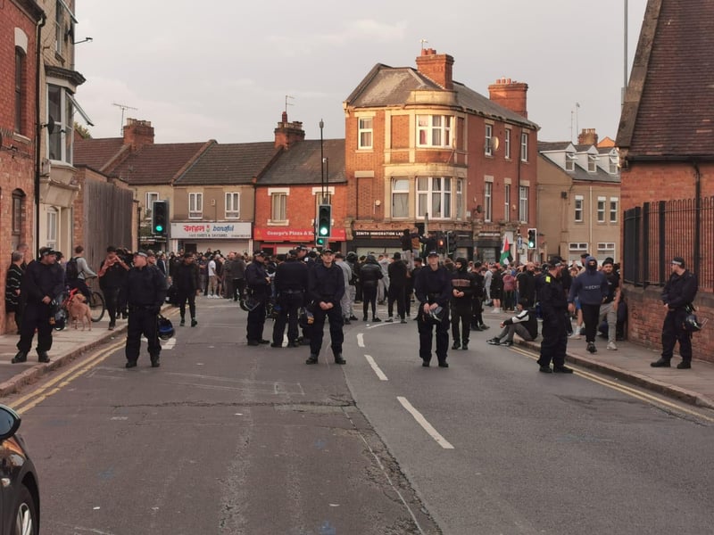 Police stand guard in Kettering Road