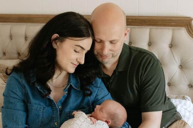 Emily and Graeme Newton and baby Ernie.