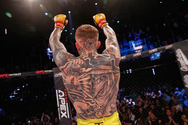 Jordan Vucenic salutes the crowd after his victory