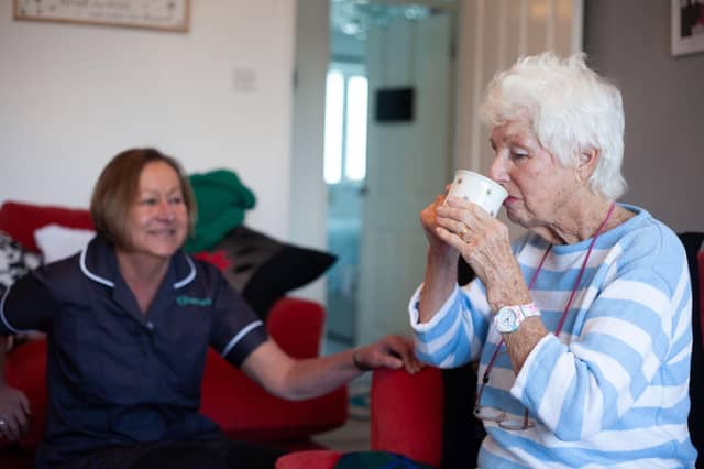 Homelium carer making sure clients stay hydrated