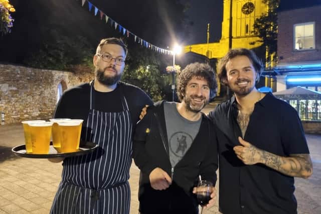 Mark Watson with staff from the Kino Lounge who provided interval drinks for the Kettering gig