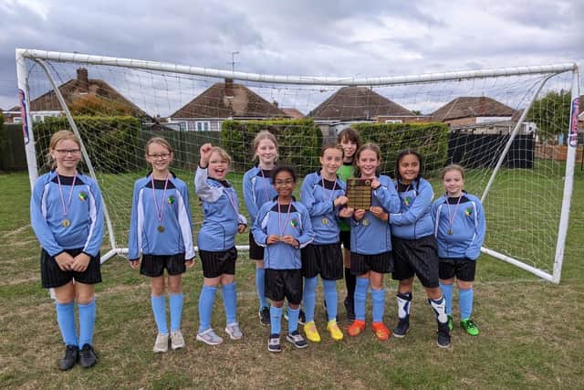 Winning the girls football competition!