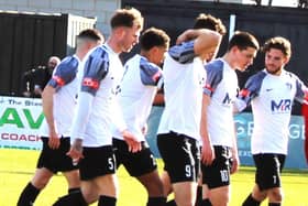 Corby Town celebrate Connor Tomlinson's goals in the 3-0 win over Walsall Wood on Saturday (Picture: David Tilley)