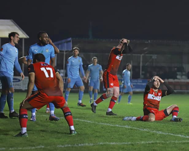 George Forsyth's reaction said it all after he missed a big chance in stoppage-time in Kettering Town's goalless draw with Farsley Celtic. Picture by Peter Short