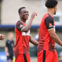 Andrew Oluwabori was all smiles after his late equaliser earned Kettering Town a 2-2 draw at Buxton last weekend. Pictures by Peter Short