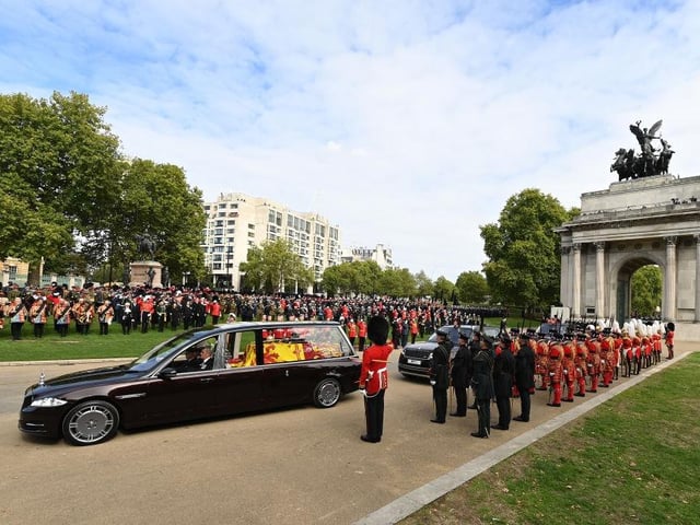 The Royal Hearse carrying the coffin of Queen Elizabeth II at Wellington Arch before heading for the late monarch's final resting place at Windsor