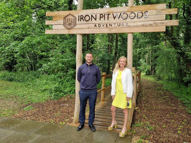 Corby, Holiday Inn Corby Kettering l-r Jamie Jackson and Janette Weedall at the entrance to Iron Pit Woods adventure area/National World