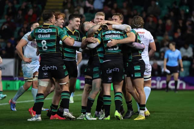 Fraser Dingwall was mobbed after bagging Saints' bonus-point try (photo by David Rogers/Getty Images)