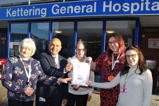 Mr Dipen Menon with members of the Clinical Audit team and the award