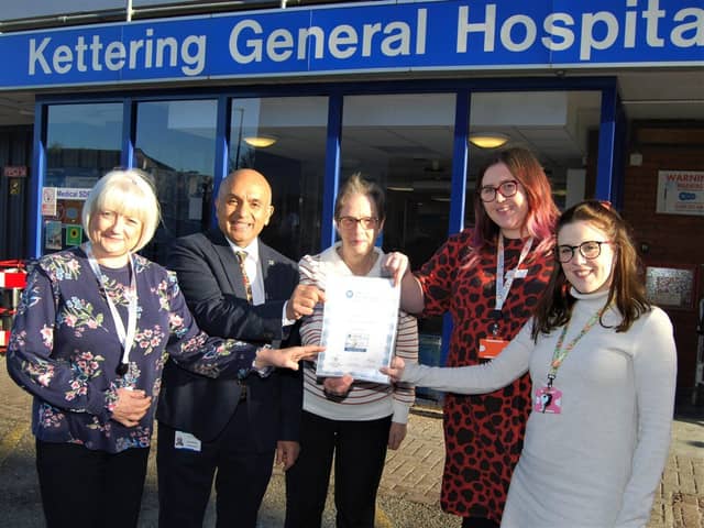 Mr Dipen Menon with members of the Clinical Audit team and the award