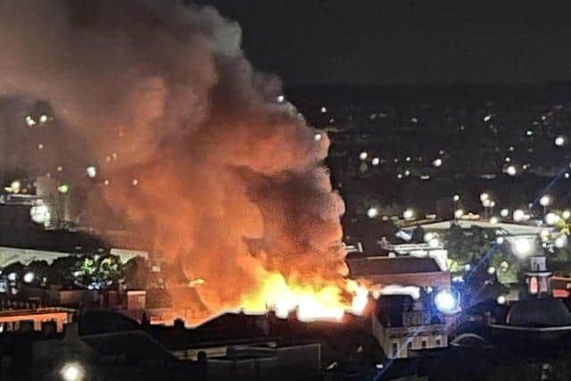 Flames and smoke billowed from out of Balloon Bar