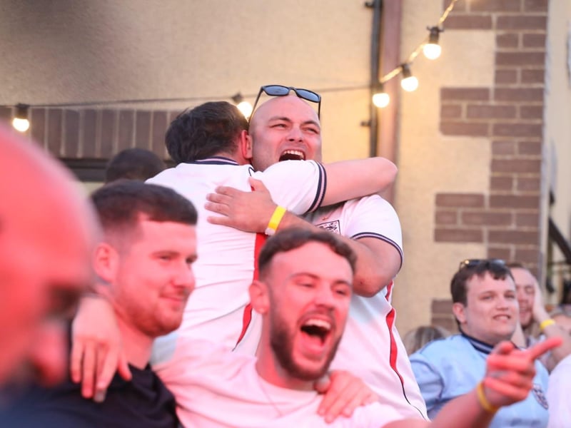 Fans at the Kettering Town FC World Cup Fan Zone watch England vs Argentina in the semi-final