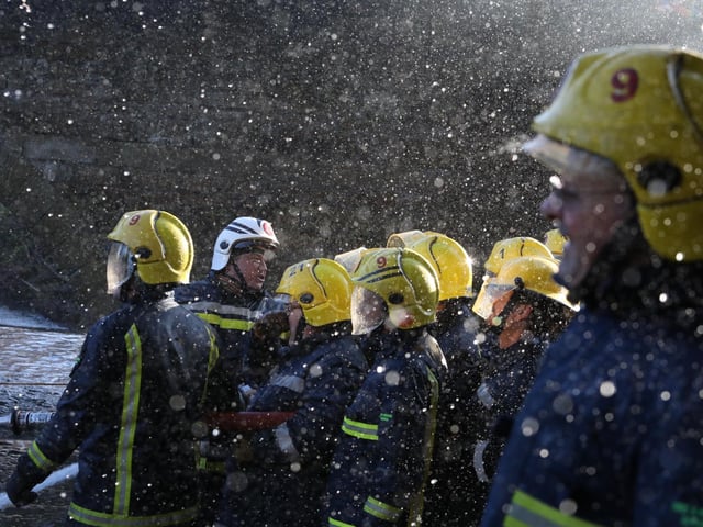 Geddington Volunteer Fire Brigade vs Northants Fire and Rescue firefighters at the annual Geddington Squirt
Geddington team