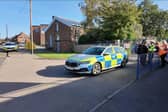 Police outside Bishop Stopford School in Kettering today