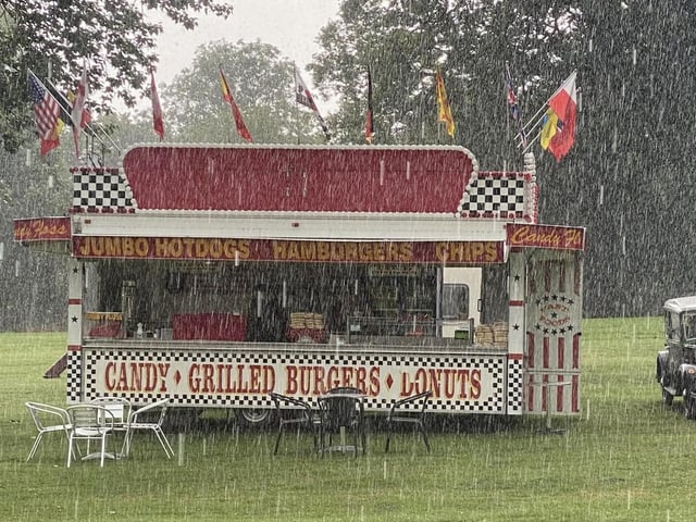 Crowds resist the rain and descend on Hall Park to enjoy the day.