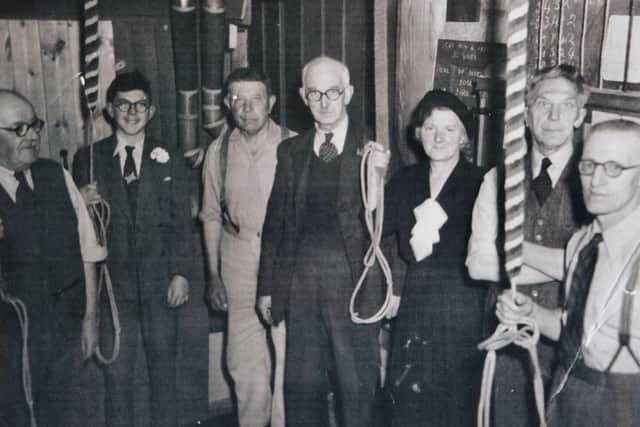 Mr Loake (second from left) in the belfry in 1953