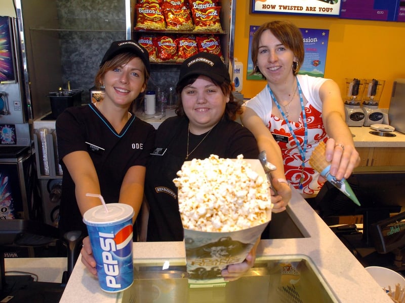 Kettering, Odeon, refurbished kiosk and entrance, l-r Tara Wright, Janice Meek, Aimee Robinson- team members with drink, popcorn and ice-cream.Tuesday, 06 November 2007 : Retro special from the archive of the Odeon, Kettering