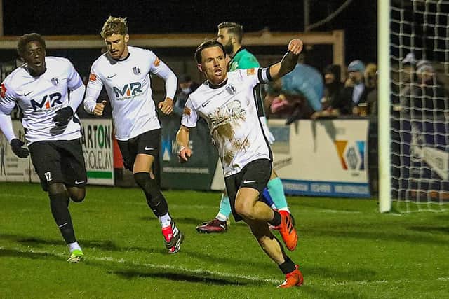 Jordon Crawford celebrates netting Corby Town's equaliser against Wellingborough Town on Wednesday night (Picture: Phil Passingham)