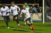 Jordon Crawford celebrates netting Corby Town's equaliser against Wellingborough Town on Wednesday night (Picture: Phil Passingham)