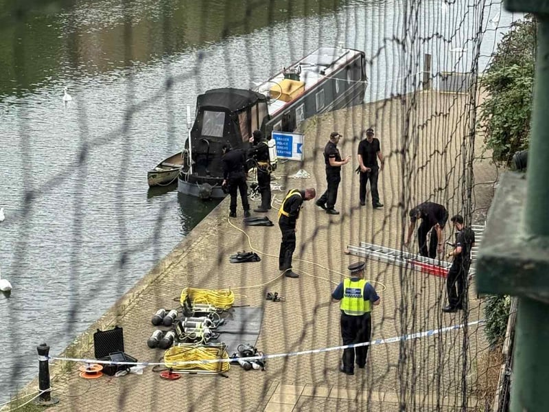 Divers were spotted searching the river on Sunday afternoon August 3.