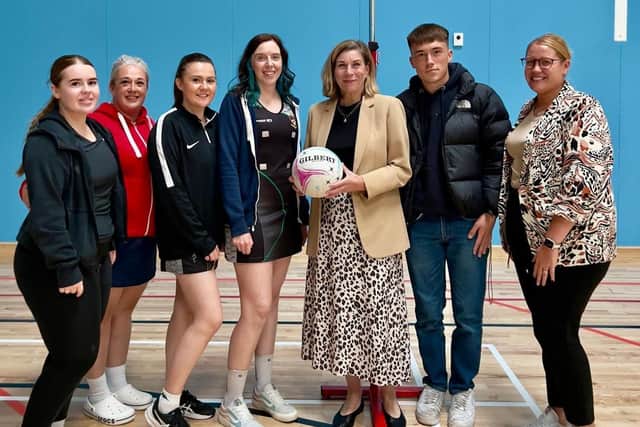 Ball & Young made a donation to the league to help pay for a second set of kit. From left: Fixtures secretary Dani McCann; Safeguarding officer Becki Duncan; CNL vice-chair Hannah Gibbons; Chair Kelly Mitchell; Ball & Young managing director Rachel Attwood, H&S apprentice Cody McBlain and wellbeing lead Hannah Morrison. Image: Corby Netball League