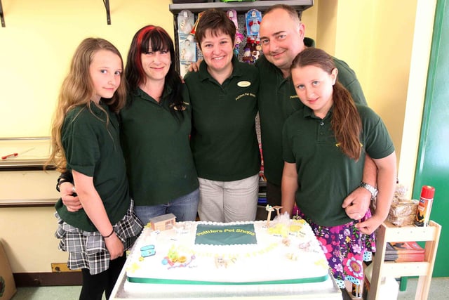 The official opening of Pettifers Pet Shops in the former Oakley Arms pub in Rushden. 
Hayley Harris, 12, Anna Winkley, Leanne Harris, owner, James Harris, manager and Katie Harris, 10 with a cake to celebrate the opening of the shop. 