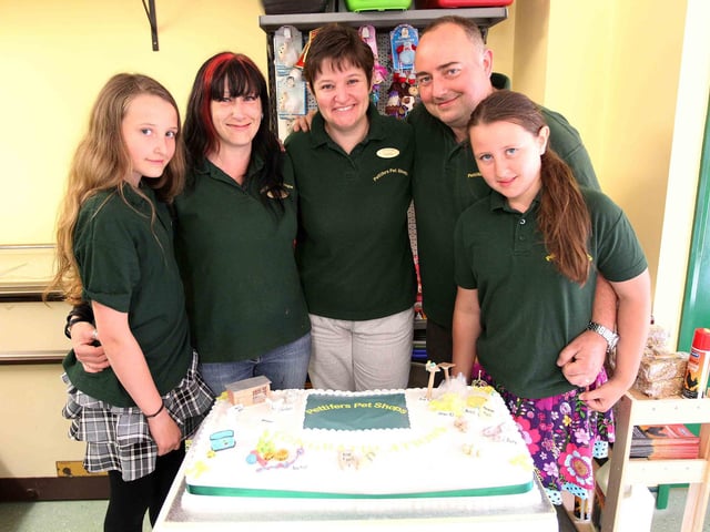The official opening of Pettifers Pet Shops in the former Oakley Arms pub in Rushden.
Hayley Harris, 12, Anna Winkley, Leanne Harris, owner, James Harris, manager and Katie Harris, 10 with a cake to celebrate the opening of the shop.