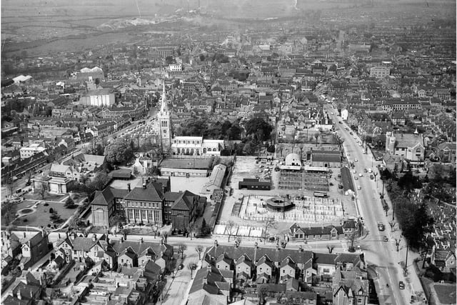 An aerial photo of Kettering featuring Bowling Green Road, the Parish Church and the Cattle Market in approximately the mid-1960s