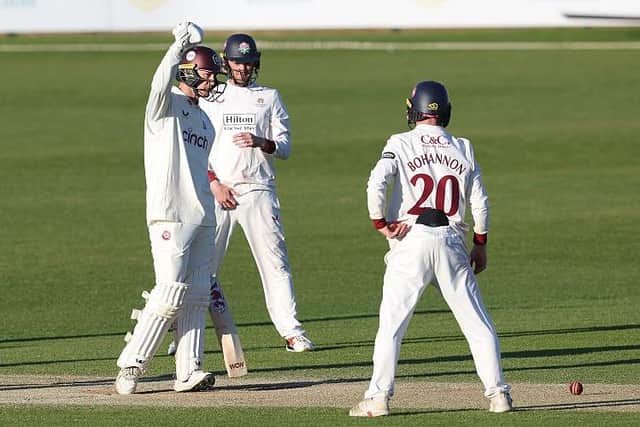 George Bartlett punches the air after safely negotiating the last ball of the match as Northants drew with Lancashire (Photo by David Rogers/Getty Images)