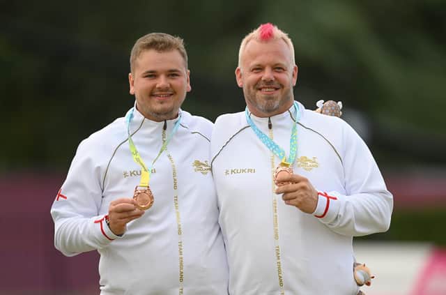 Kettering's Kieran Rollings (left) and Craig Bowler show off their Commonwealth Games bronze medals. Pictures courtesy of Getty Images