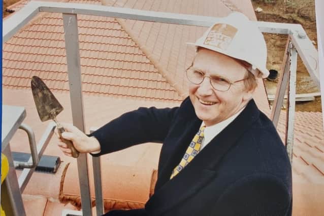 Dr John Smith at the topping out ceremony in 1998