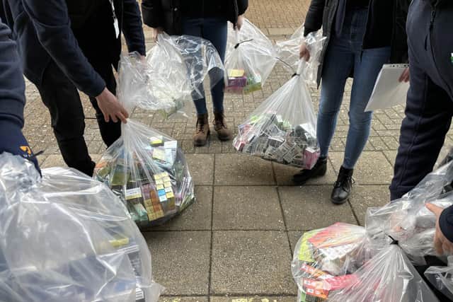 A huge haul of illegal cigarettes and vapes was taken away from the shop. Image: National World