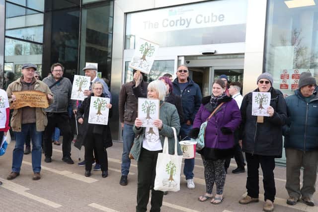 Campaigners outside North Northants Council's Corby Cube/National World