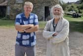 Trevor Stainwright with miller Nigel Moon, who owns and runs the tower mill at Whissendine, Rutland