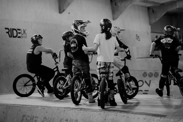 Young BMX riders at Adrenaline Alley