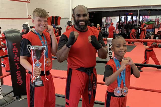 Oscar Clayton, Izaiah Spencer and coach Richard Phillips