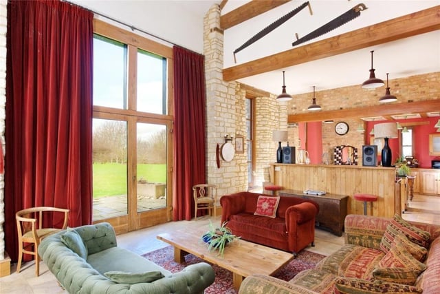 This barn conversion home comes with annexes and a lot of land.