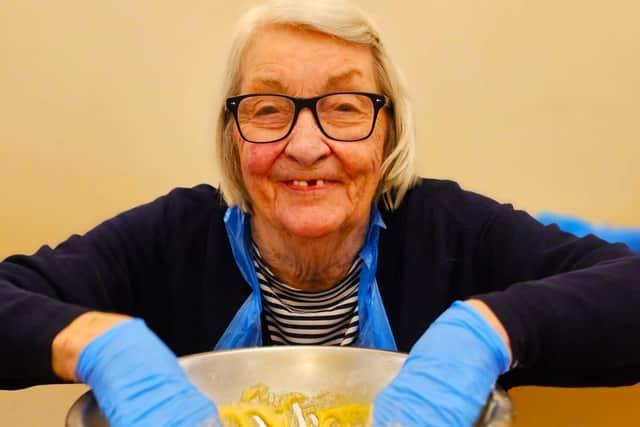 Pat having fun with cake mix