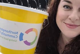 Natalie Částka co-director of Laugh Out Loud Theatre Company collecting donations.