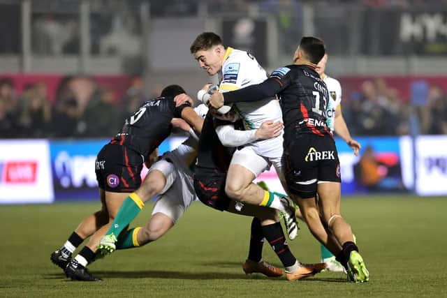 Tommy Freeman in action against Saracens in December (photo by David Rogers/Getty Images)