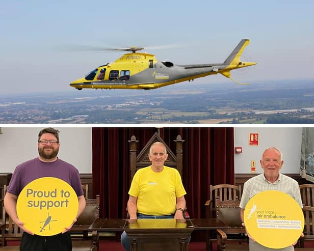 Ian Lutter (middle) is raising money for the Warwickshire and Northamptonshire Air Ambulance