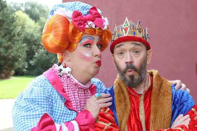 l-r Mark Siney as Dame Trott with Todd Carty as King Custard